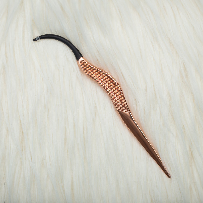 Curved rose gold tweezer